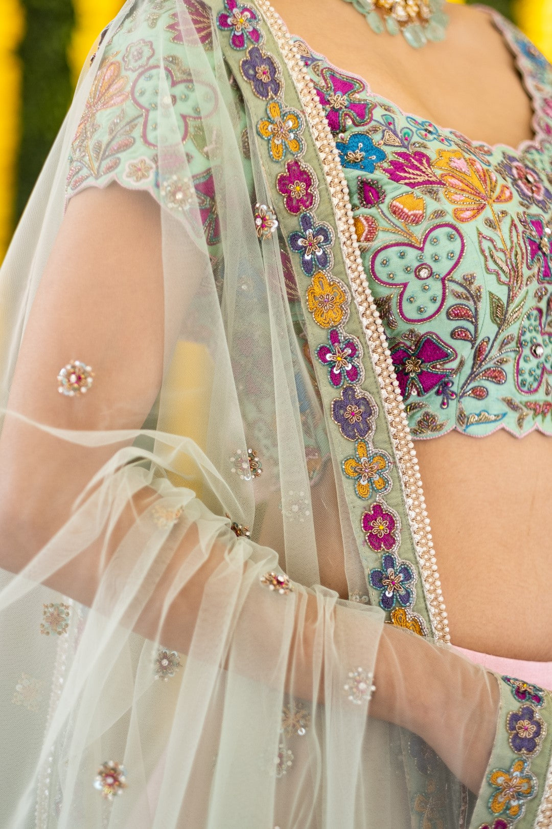 Mint blue blouse with rose pink kalamkari lehenga set