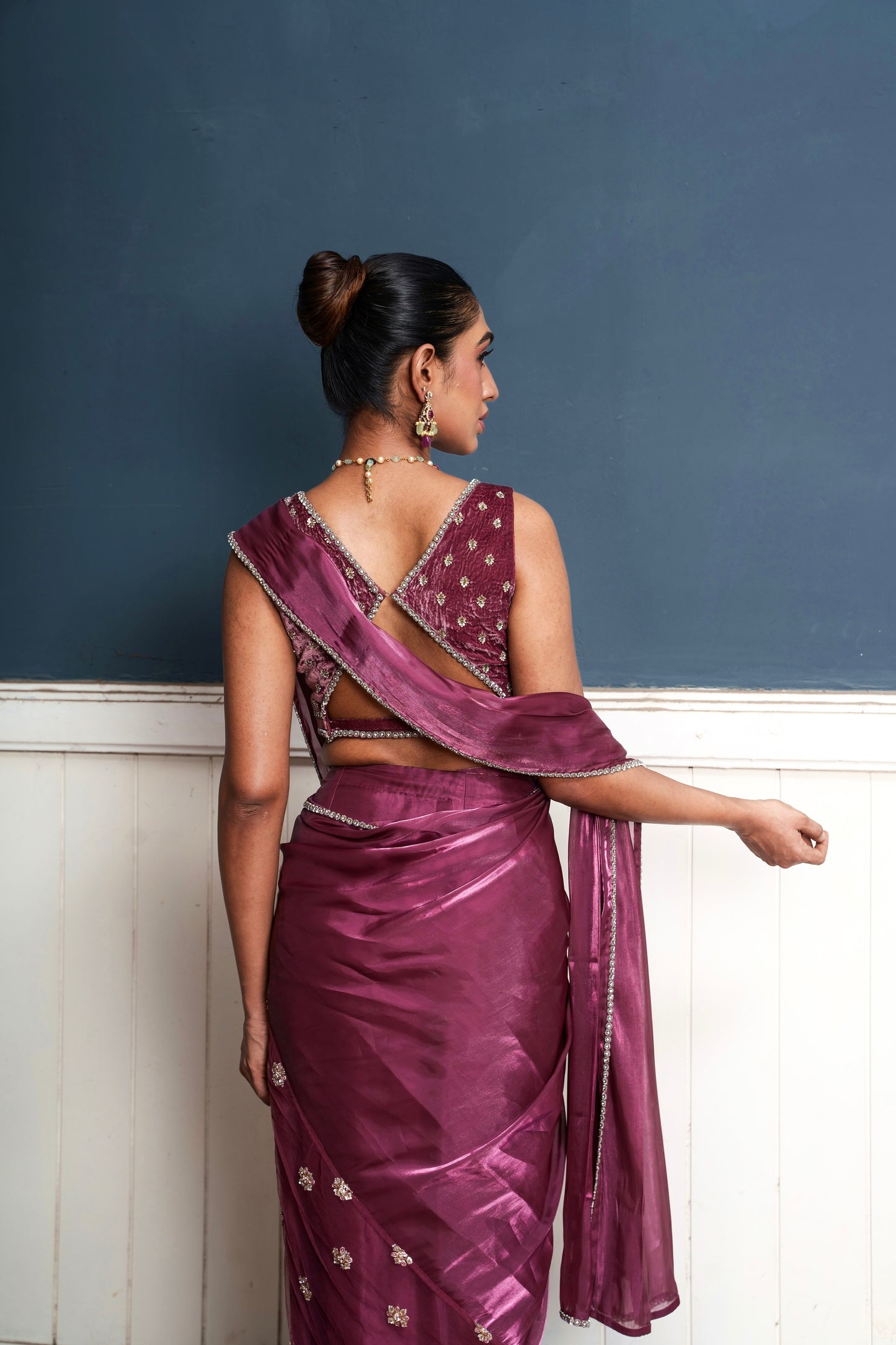 Traksh- wine shade embroidered pre-draped saree