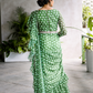 Dark green belted ruffle saree